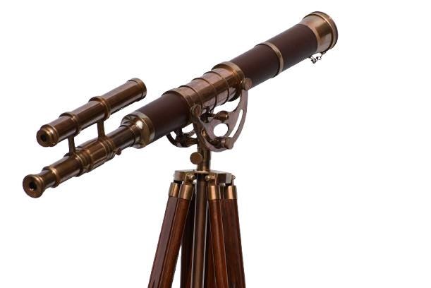 May include: A vintage-style telescope with a dark brown barrel and brass accents. It features a smaller, parallel scope and is mounted on a wooden tripod. The design evokes a classic nautical or scientific aesthetic.