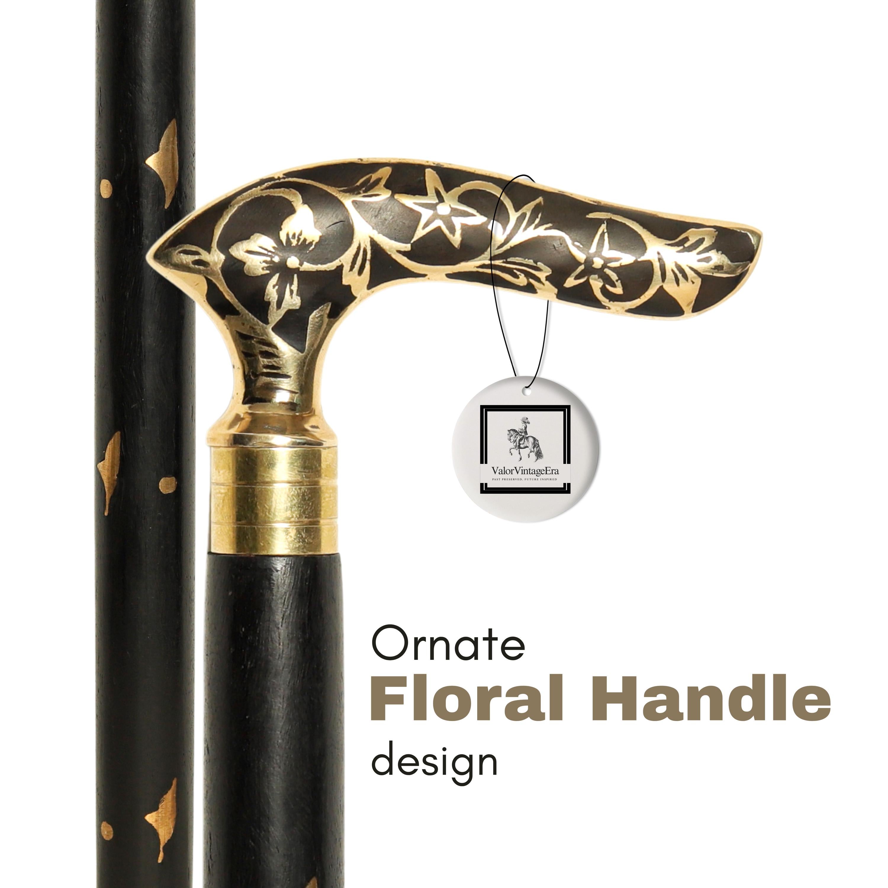 May include: Black walking cane with a gold and black floral handle design. The handle is curved and features intricate floral patterns. The cane's shaft is black with gold accents. The text "Ornate Floral Handle design" is displayed.